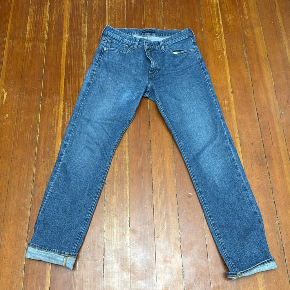 Levis premium 511 32x32 selvedge denim jeans. Tiny white dot (pointed in photo)